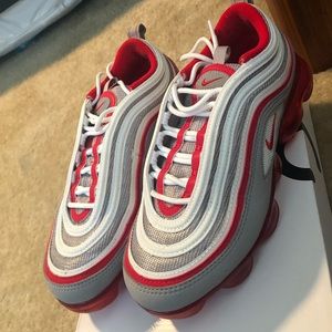 Red and white Nike 97s